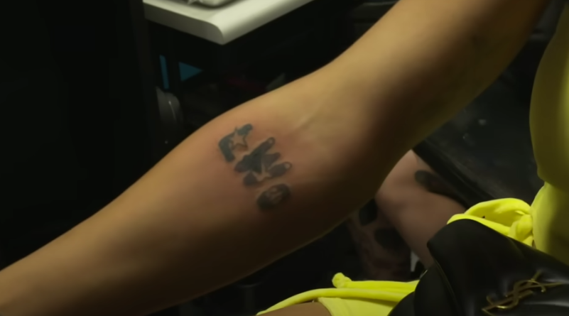 Paige got her Papi tattoo because it just makes her laugh  Cageside Seats